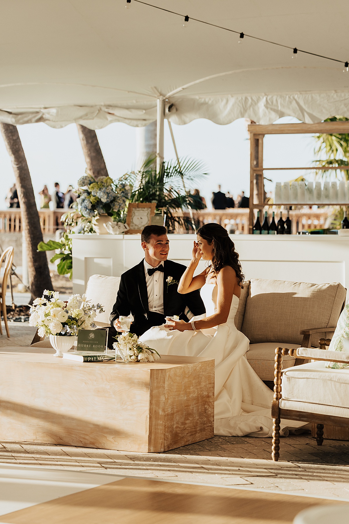 Couple sits on couch and talks at The Ringling Museum